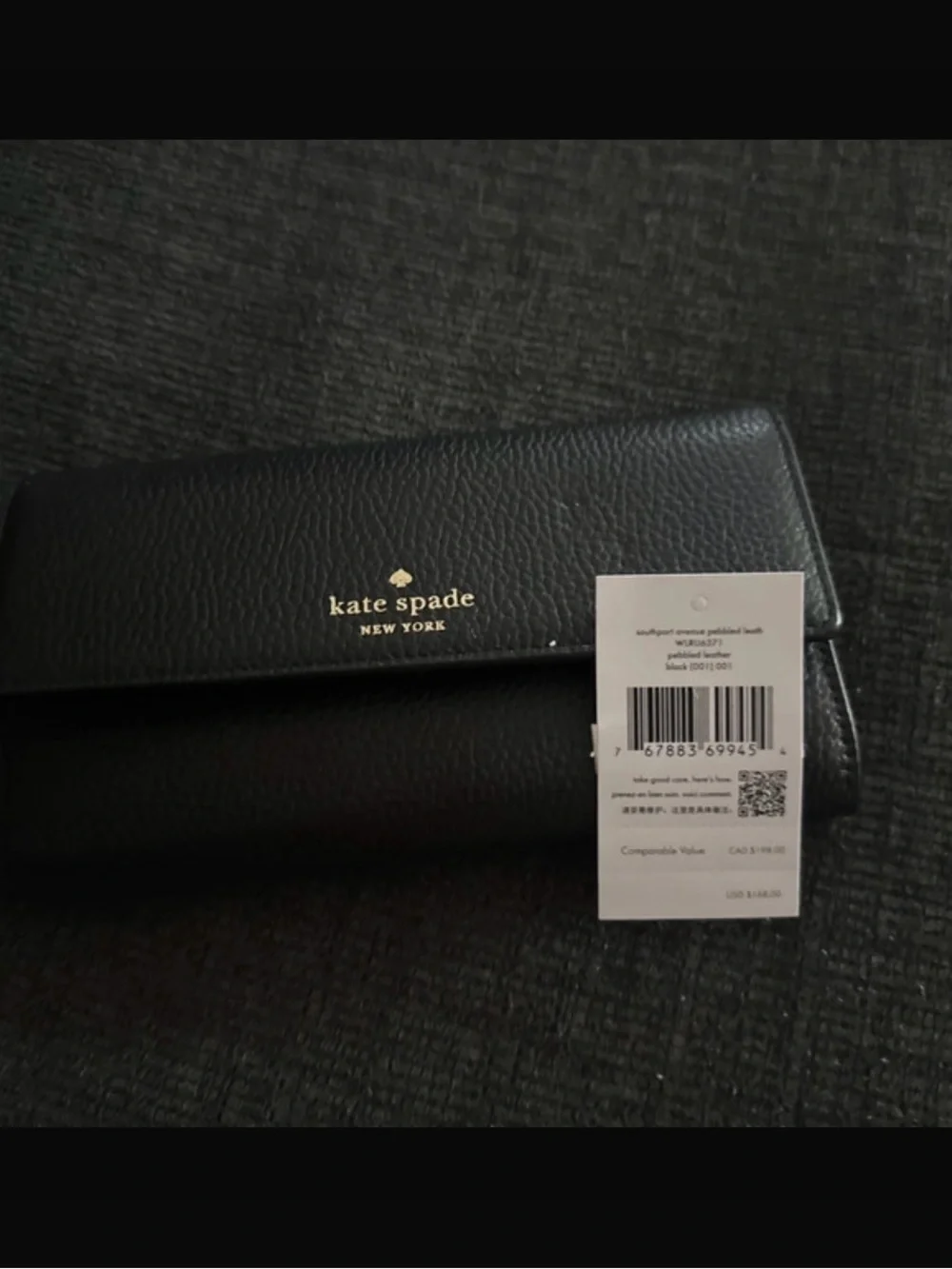 kate spade black pebbled leather continental clutch wallet with gold logo